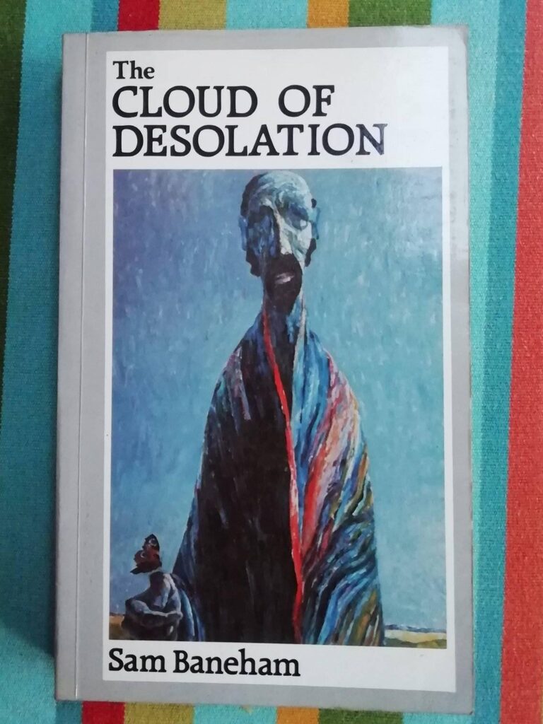 Book cover of 'The Cloud of Desolation' by Sam Baneham. It shows a painting of a man in a faded, multi-coloured robe. A butterfly sits just above the man's right hand.