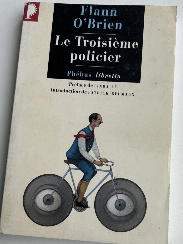 image shows the cover of 'Le Troisième Policier', showing a cartoon of a man on a bicycle.
